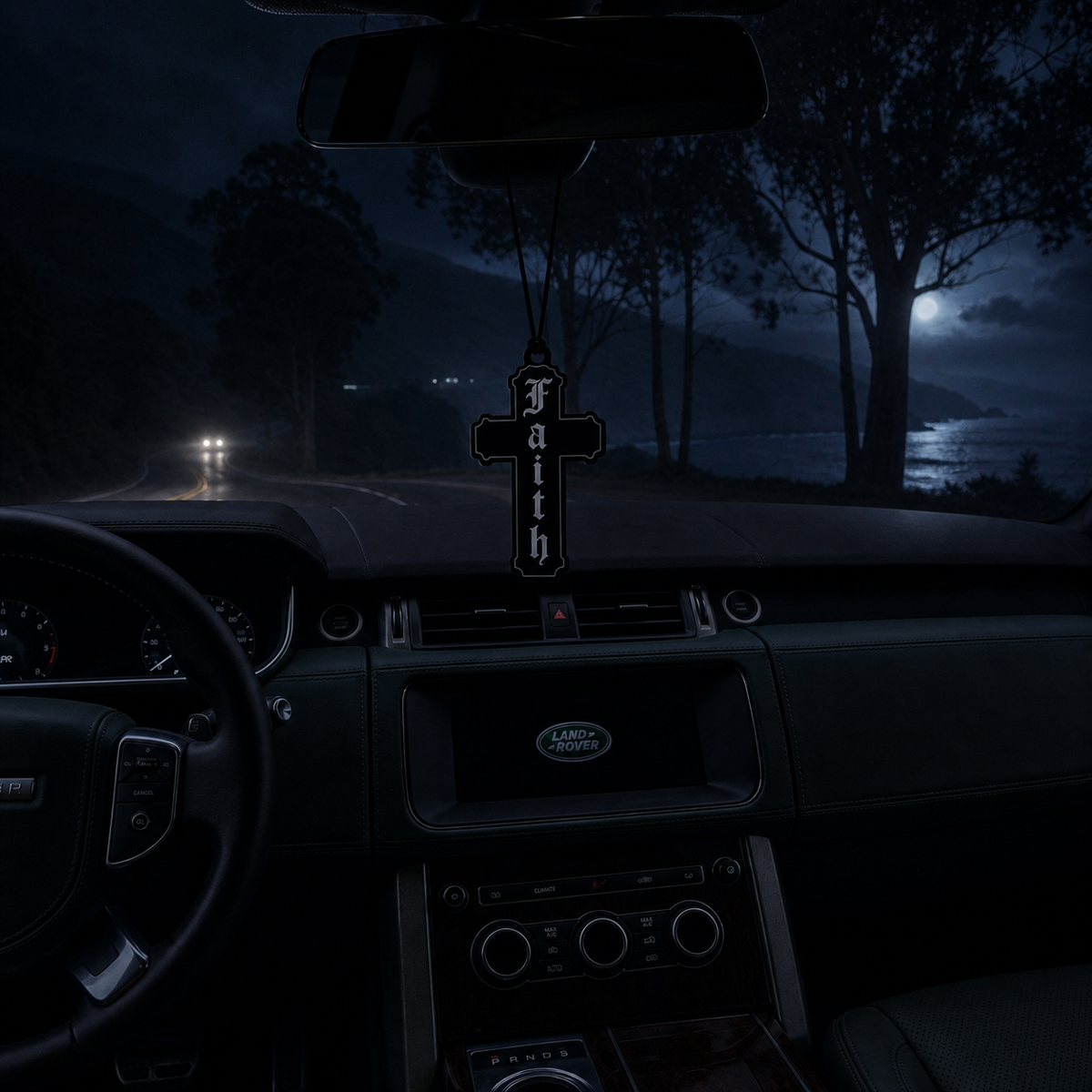 Faith Cross car air freshener in a nighttime car interior