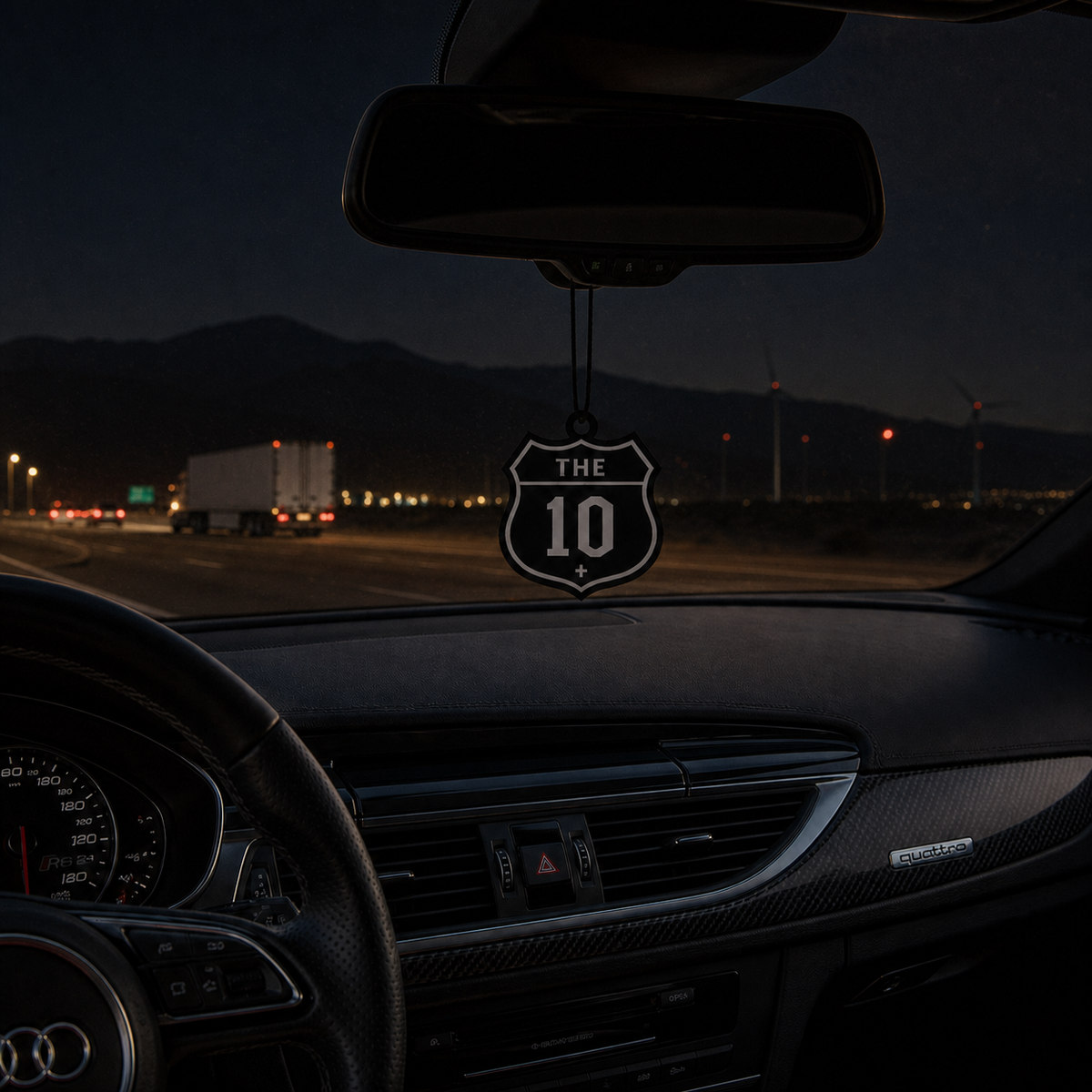 The 10 car air freshener in a nighttime car interior